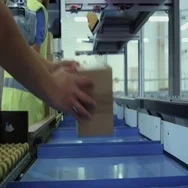 Parcels Are Moving On Belt Conveyor At Post Sorting Office. Box Pov. Stock Footage