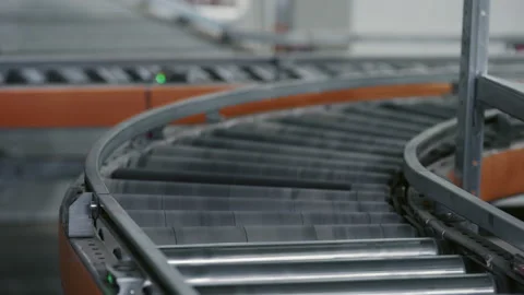 Parcels Conveyed on a Belt System. Video stock 244131344