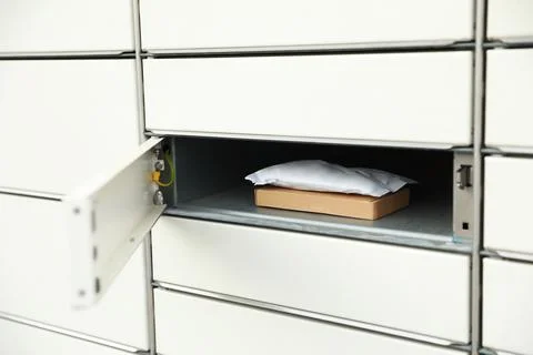 Parcels in locker of automated postal box 写真素材