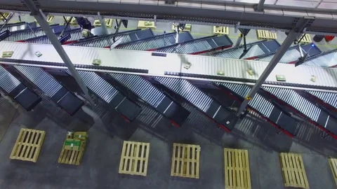 Parcels move on transporter line in warehouse. Aerial view Stockbeeldmateriaal 82682724
