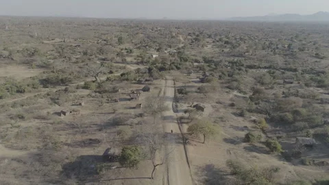 Parched dry village landscape by drone in Malawi, Africa LOG Stock Footage 276111908