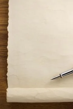 Parchment scroll on wood Stock Photos