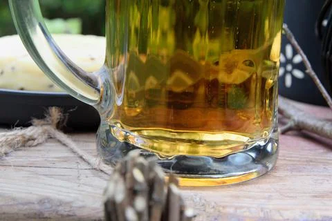 Pareidolia effect: natural bunny reflection in a beer mug during Midsummer Stock Photos
