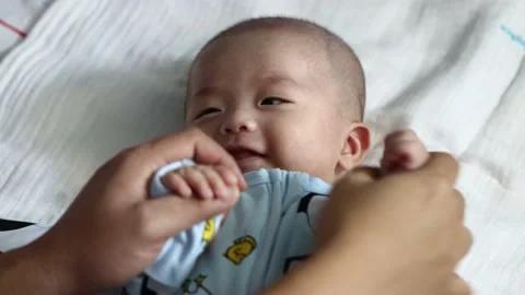 Parent and cute infant child boy relax and enjoy together at home. Happy fami Video stock 141017465