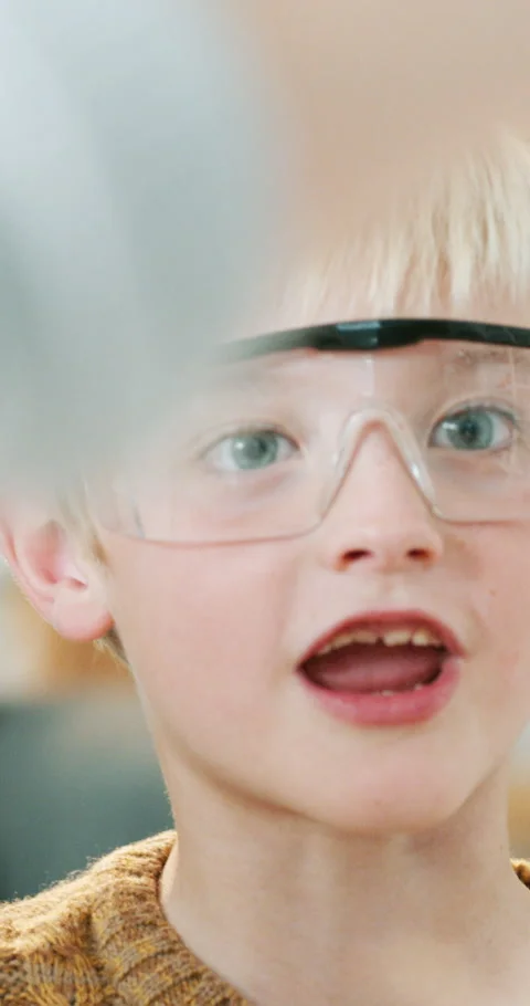 Parent, boy and excited with science experiment in home for chemistry, bonding Stock Footage 336682607