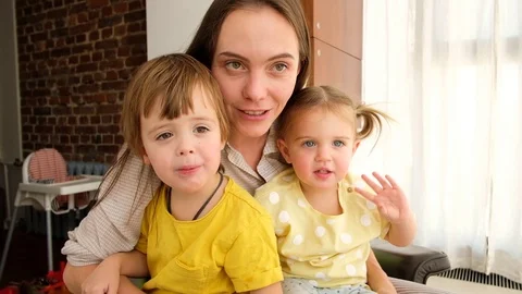 Parent with children by video connection Video stock 127964541