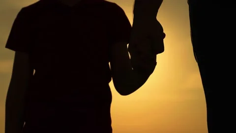 Parent, kid boy outing together. Adoption of child. Child father walk in autumn Stock Footage 214516609