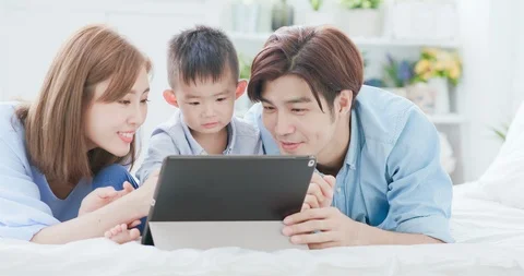 Parent play with child by tablet Stock Footage 105688563