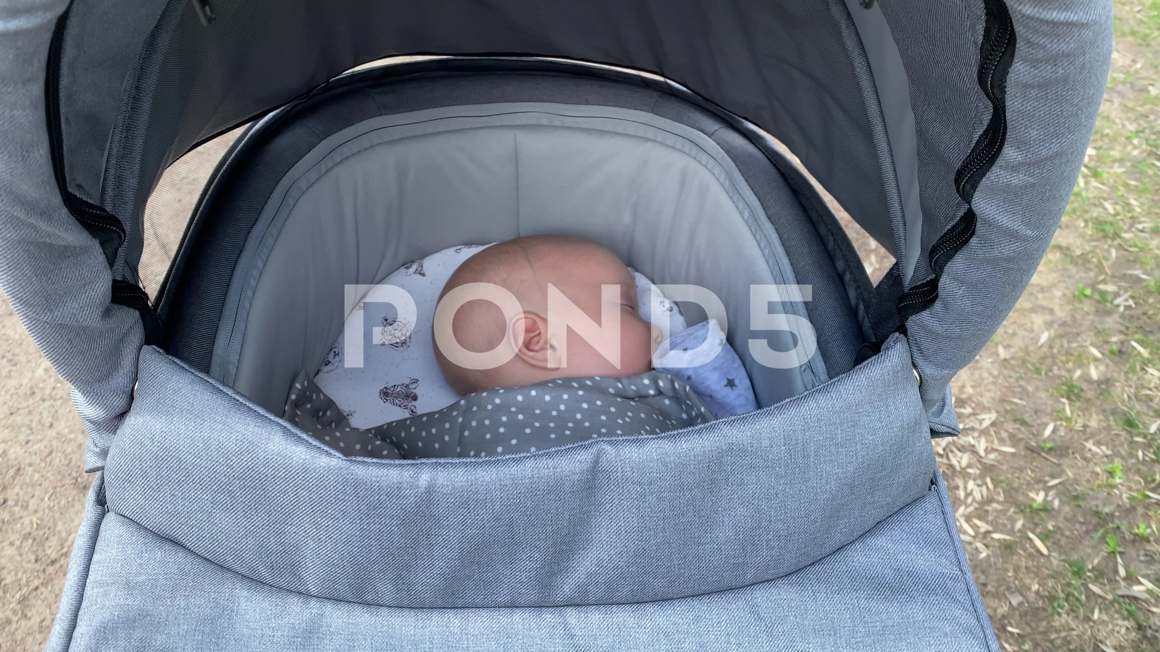 parent pushing carrycot stroller with Stock Video Pond5