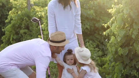 Parents and small daughters makes selfie, summertime vacation Stock Footage 120413609