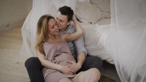 Parents to be are having intimate moments Stock Footage 87805823