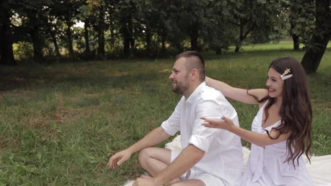 Parents calling their son at picnic. Video stock 140854331