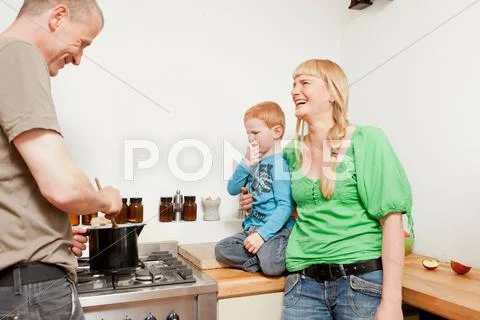 Parents Cooking For Reluctant Son