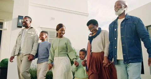 Parents, generations and holding hands with children, backyard or walking with Stock Footage 337537842