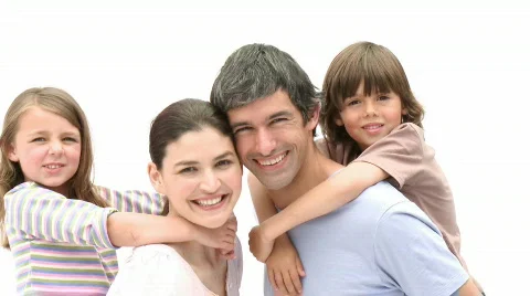 Parents giving children piggyback ride Stock Footage