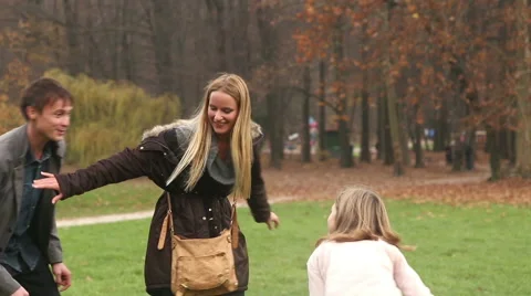Parents having fun with daughter in nature Stock Footage 59554111