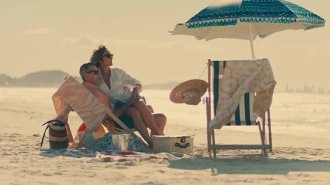 Parents in love at the beach Stock Footage 262386658