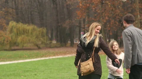 Parents playing with daughter in nature Stock Footage 59554118