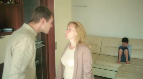 Parents quarrel with his son. mother and father arguing. stress in a child Stock Footage