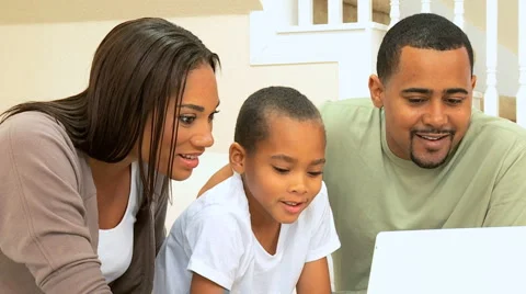 Parents &amp; Son Using Laptop Computer Video stock 4552570