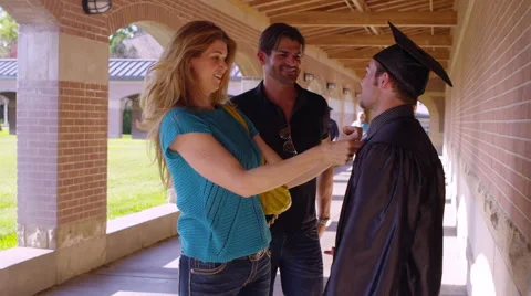 Parents talking to graduating son Stock-Footage 67298162