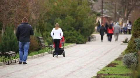 Parents walking with a pram. Stock Footage 67615721