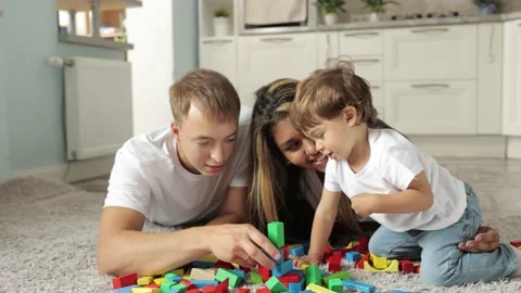 Parents watch the development of their child. Time spent together. Stock-Footage 238764352