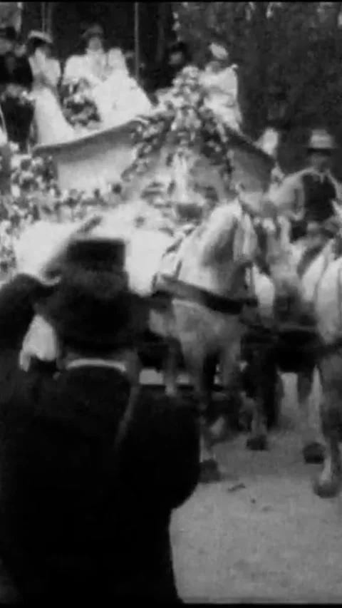 PARIS - 1897 - A chariot parade passes down a Parisian street in Paris, France. Stock-Footage 342239100