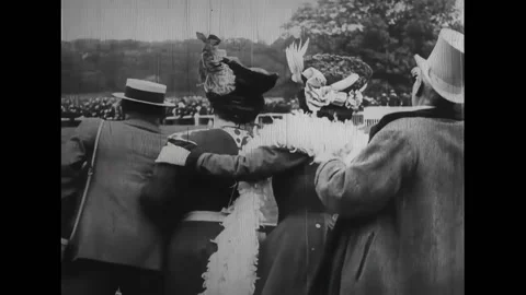 PARIS - 1900 - A friend borrows the matron’s binoculars. Through them, he gets a Stock Footage 325209283