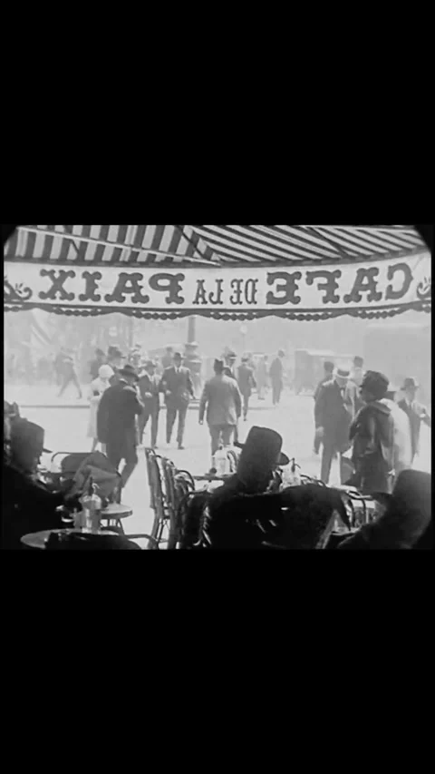 PARIS - 1927 - Guests leave the Cafe de la Paix in Paris, France, and patronize Video stock 342244614