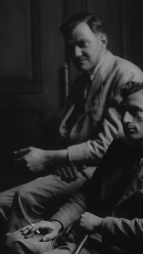 PARIS - 1936 - Men wait to be seen at the US Ambassador in Paris. Video stock 342819979