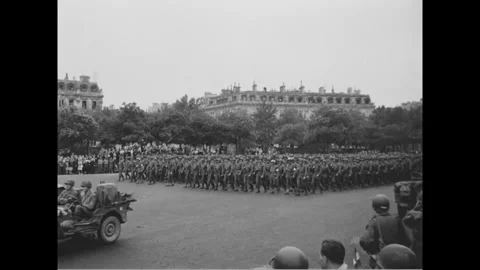 PARIS - 1944: 28th Division parade - Infantry crosses a mansard-roofed plaza Stock-Footage 344005755
