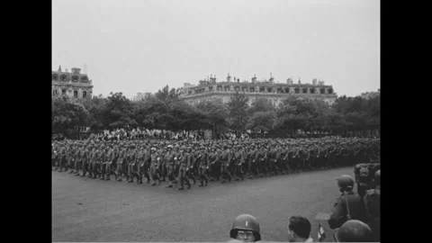 PARIS - 1944: 28th Division parade - Ranks march past a Haussmann building Stock-Footage 344005758