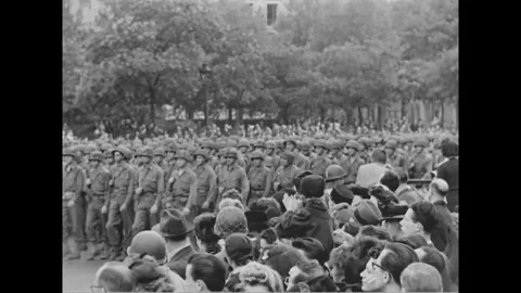 PARIS - 1944: 28th Division parade - Massed infantry ranks fill a Paris roadway Stock-Footage 344005808