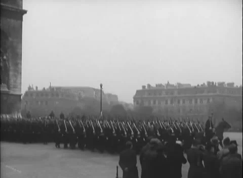 PARIS - 1944: Distant column — Armistice column marches across Paris Stock-Footage 347864053