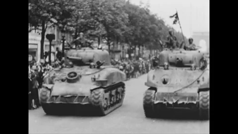 PARIS - 1944: Tank column - Two tanks pass close with troops roadside Stock-Footage 344005825