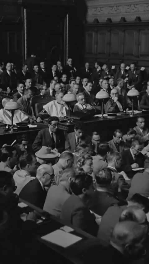 PARIS - 1945 - A justice takes notes during Philippe Petain's trial for treason. Video stock 342662843