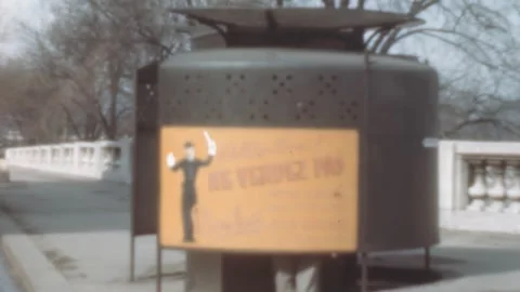 Paris - 1950: Man inside a public mens restroom in the middle of city sidewalk Stock Footage 245801878