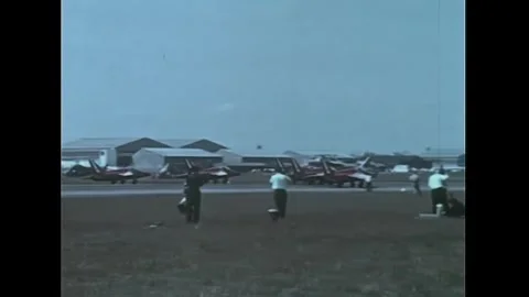 PARIS - 1967 - The Royal Air Force's Red Arrows fly in precision formation at Stock-Footage 341993598