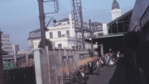 Paris - 1967: Train arrives at Gare de Lyon train station passengers waiting Stock Footage 182995005