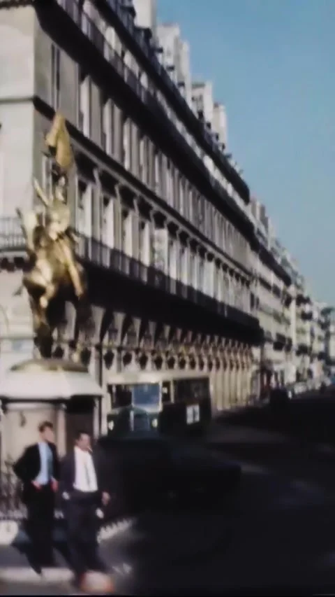 PARIS - 1969 - The Apollo 11 astronauts' motorcade drives past the Eiffel Tower Video stock 342655411