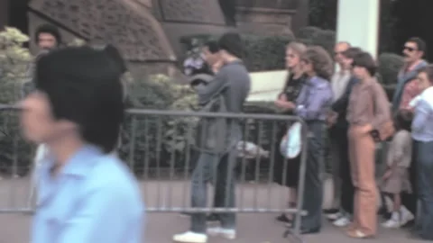Paris - 1979: Crowd of visitors stand in a queue to go up the Eiffel Tower Stock Footage 171120510