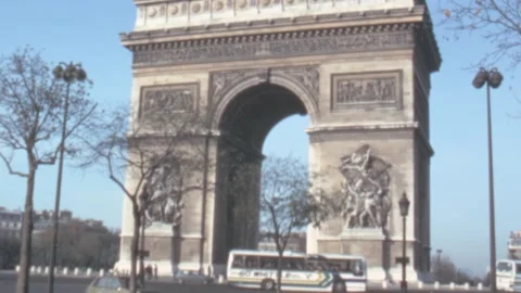 Paris - 1981: Traffic in front of the triumphal arch on a sunny day Stock Footage 246476835