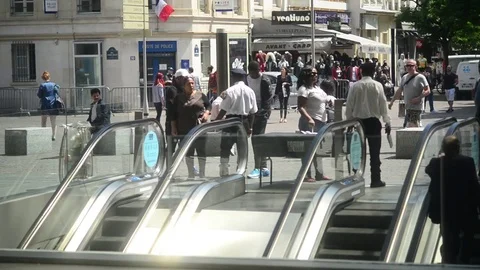 Paris anti-terrorist measures, checking people into metal objects on escalator Stock Footage 76407487