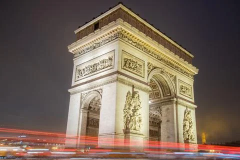 Paris Arc de Triomphe long exposure with traffic lights. Majestic Structure Stock Photos