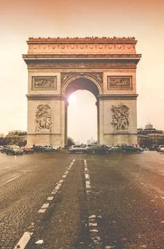 Paris Arc de Triomphe in sunset Stock Photos