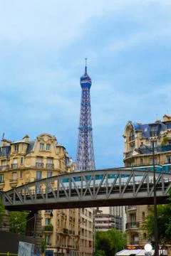 Paris. Bridge before building. Train of underground goes on bridge.. Stock Photos