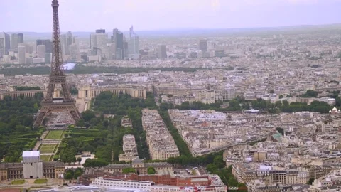 Paris buildings rooftops and Eiffel Tower from Montparnasse Tour, Paris, France Stock Footage 237924101
