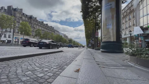 Paris, Champs Elysees is a highly regarded shopping boulevard, time lapse Stock Footage 313919737