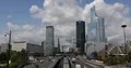 Paris City Skyline with Cars Traffic on Busy Street and Metro Train Passing Day 4k or 4k+ Resolution